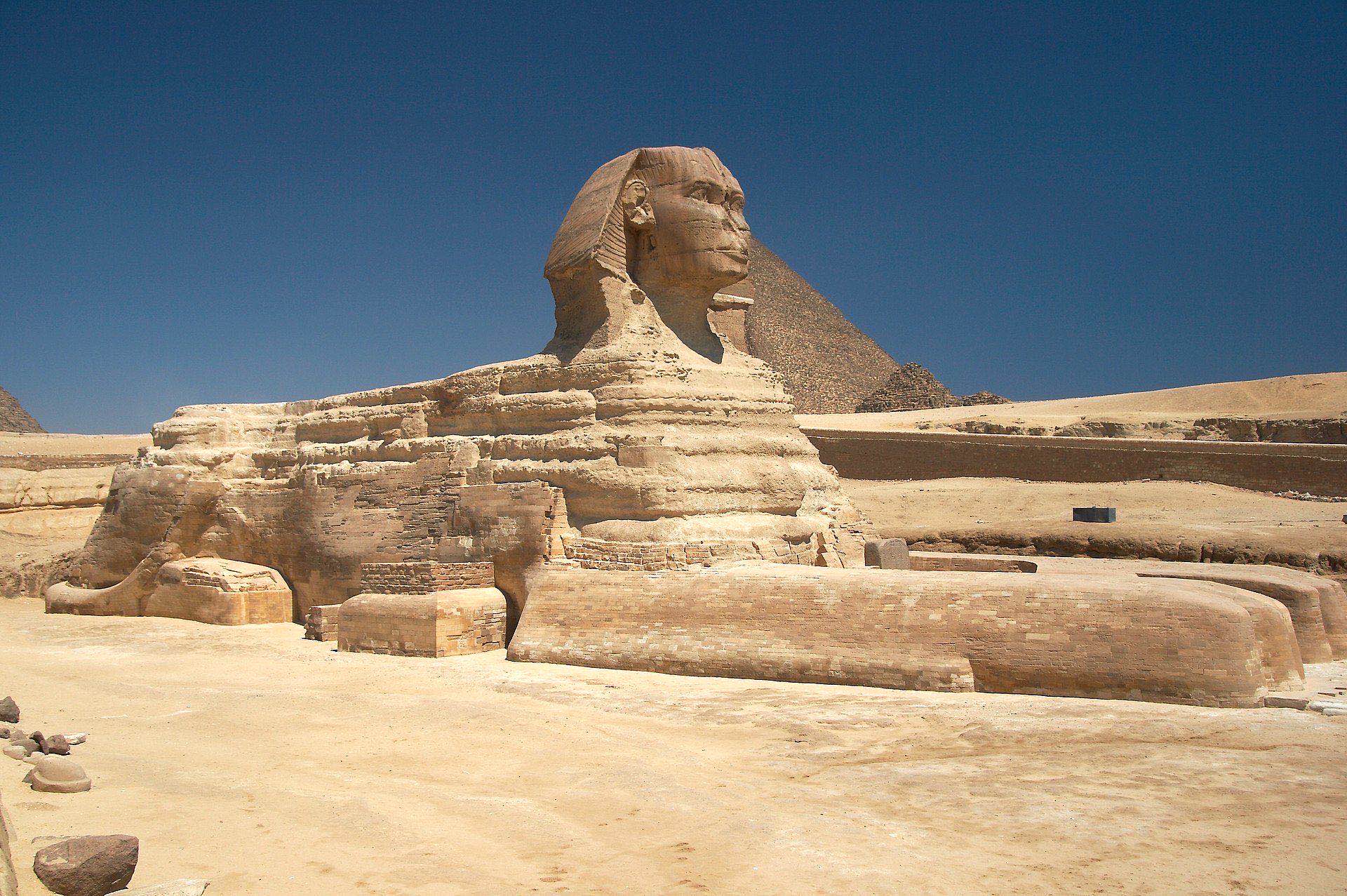 Great Sphinx of Giza at sunrise with the Khafre Pyramid behind